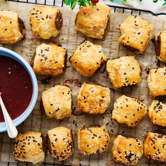 Duck sausage rolls with cherry and plum dipping sauce