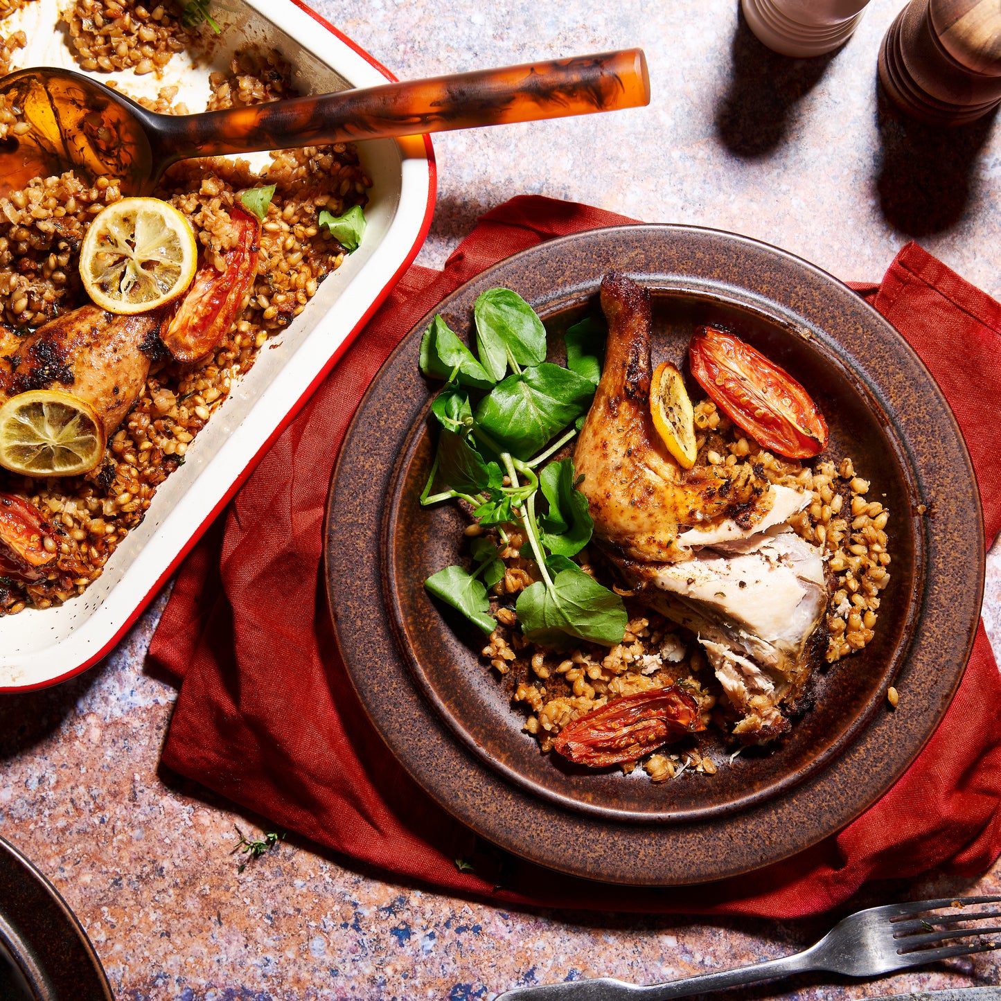 Roast chicken marylands with pearl barley, leek and roasted tomatoes