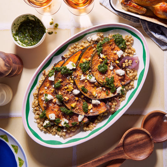 Maple roasted pumpkin wedges with freekeh and pistachio