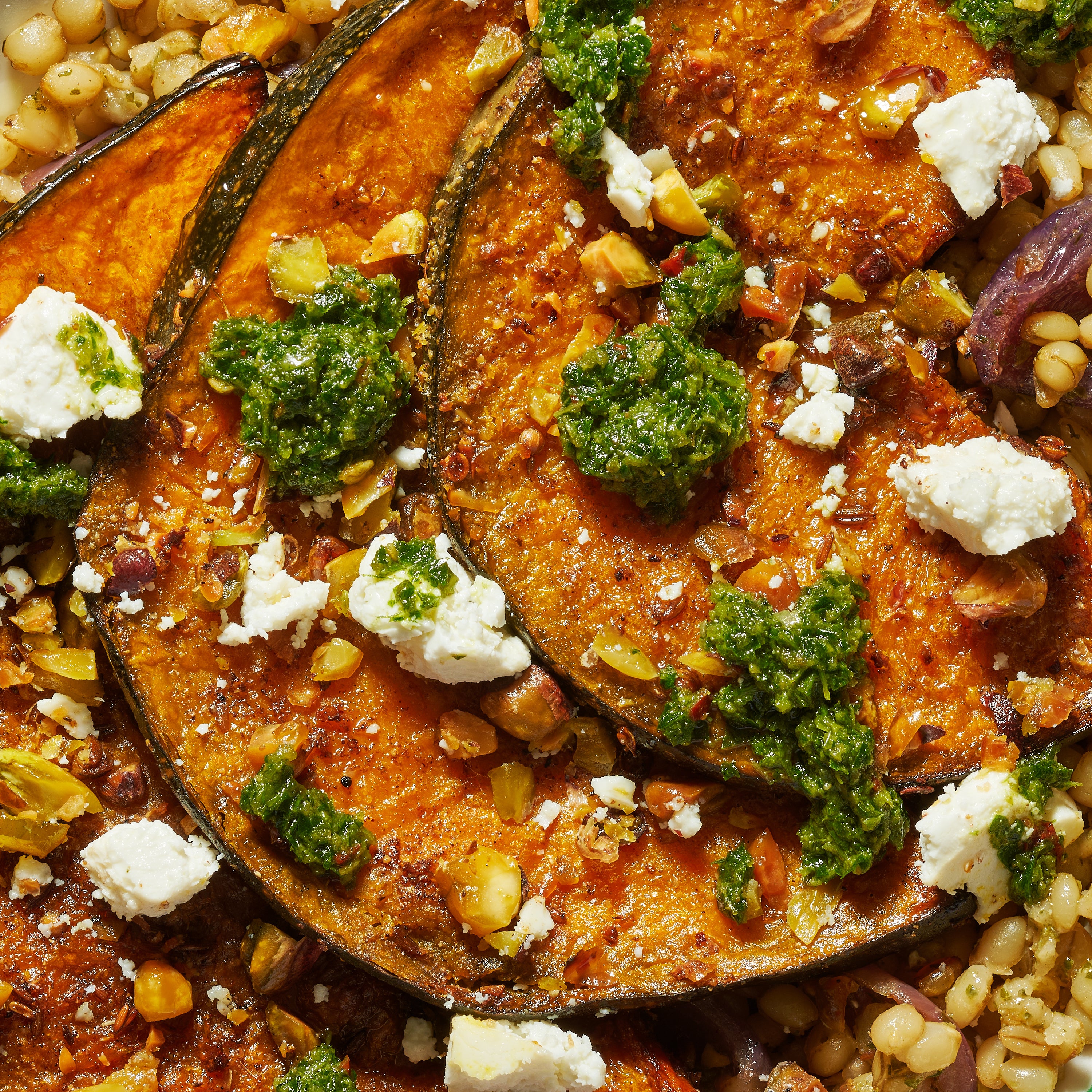 Maple roasted pumpkin wedges with freekeh and pistachio