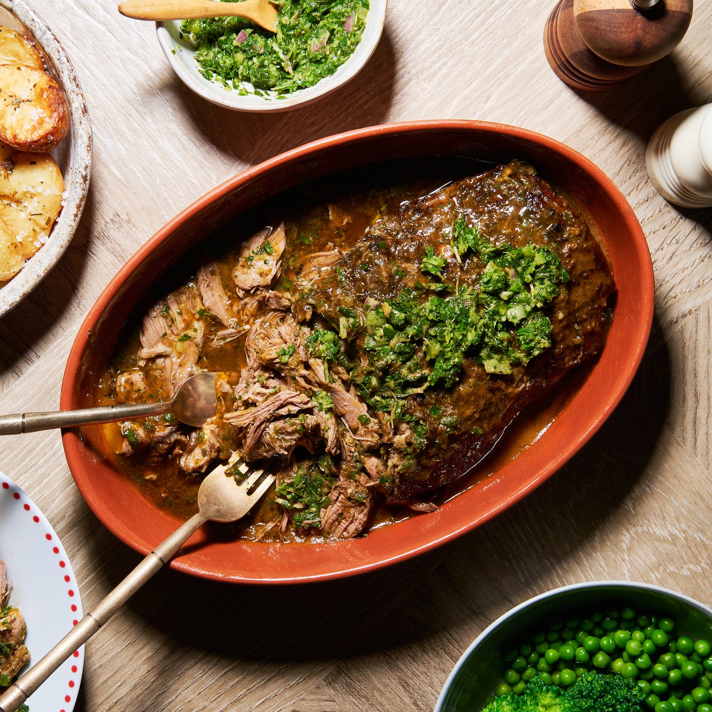 Herby slow-cooked boneless leg of lamb with mint salsa verde