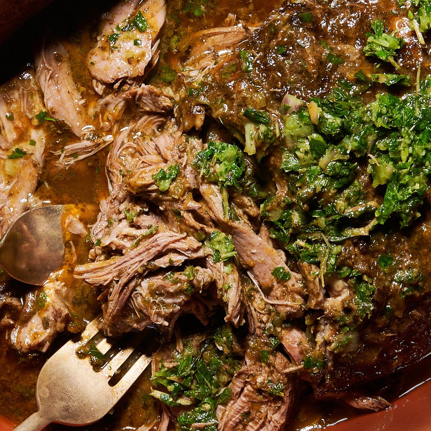 Herby slow-cooked boneless leg of lamb with mint salsa verde